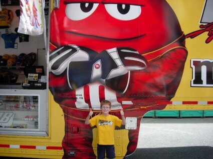 <i>Kyle, happily standing in front of Kyle Busch's trailer.</i>